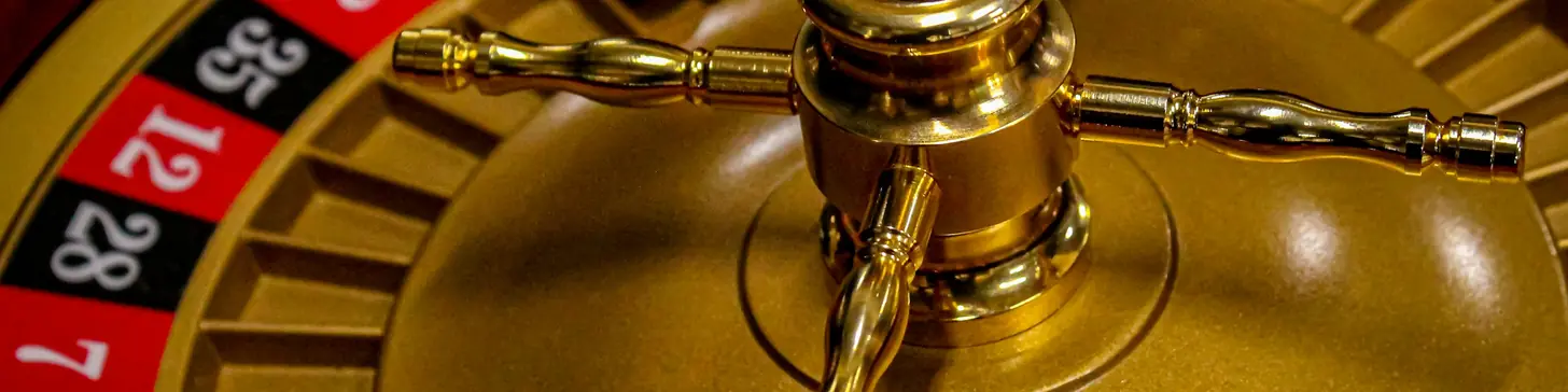 Close-up of a golden roulette wheel