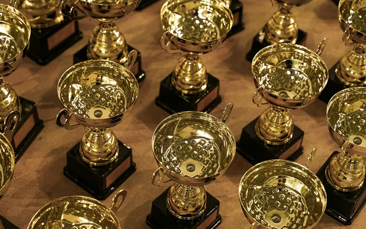 Rows of golden trophy cups